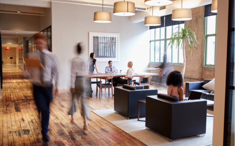 People walking in an office space
